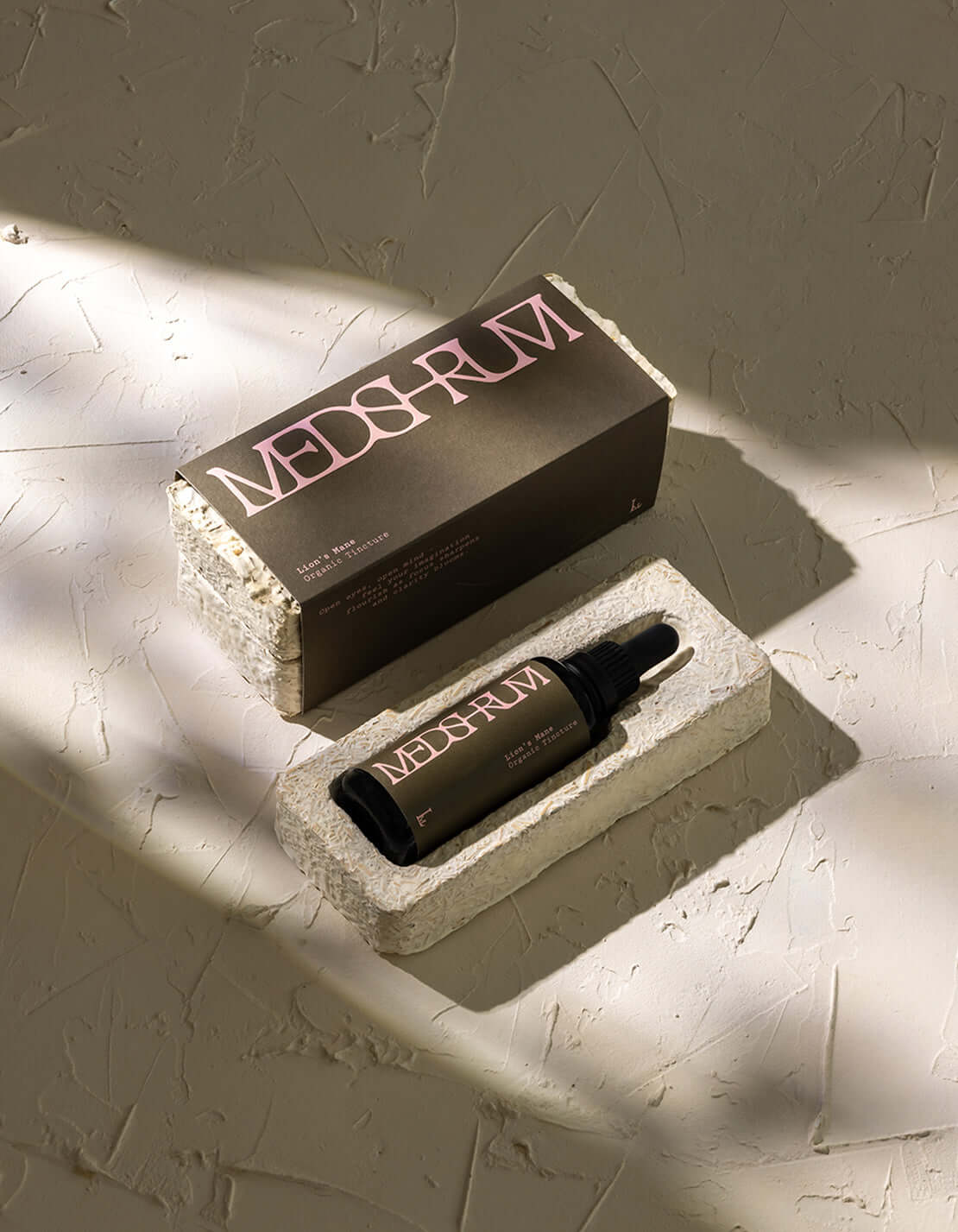Medshrum Lions Mane Organic Tincture, displayed with sustainable mycelium packaging on a neutral backdrop.